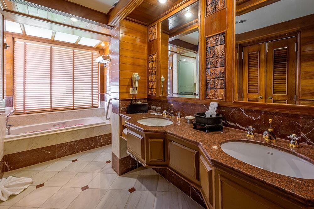 Elegant ensuite bath at Thavorn Beach Village luxury resort in Phuket