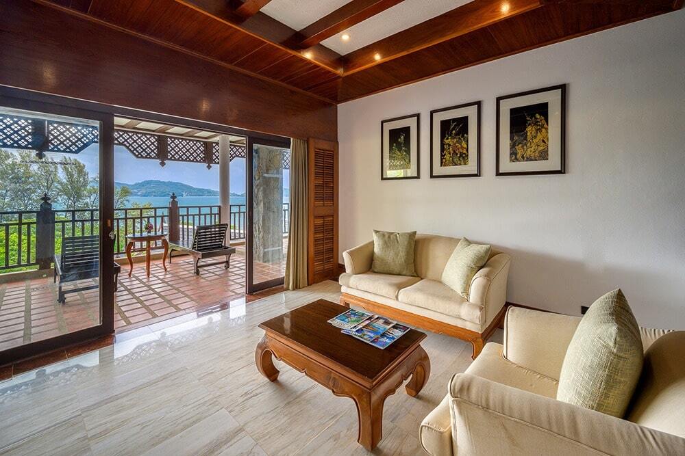 Thavorn Beach Village Resort's 2-bedroom suite with a living room area